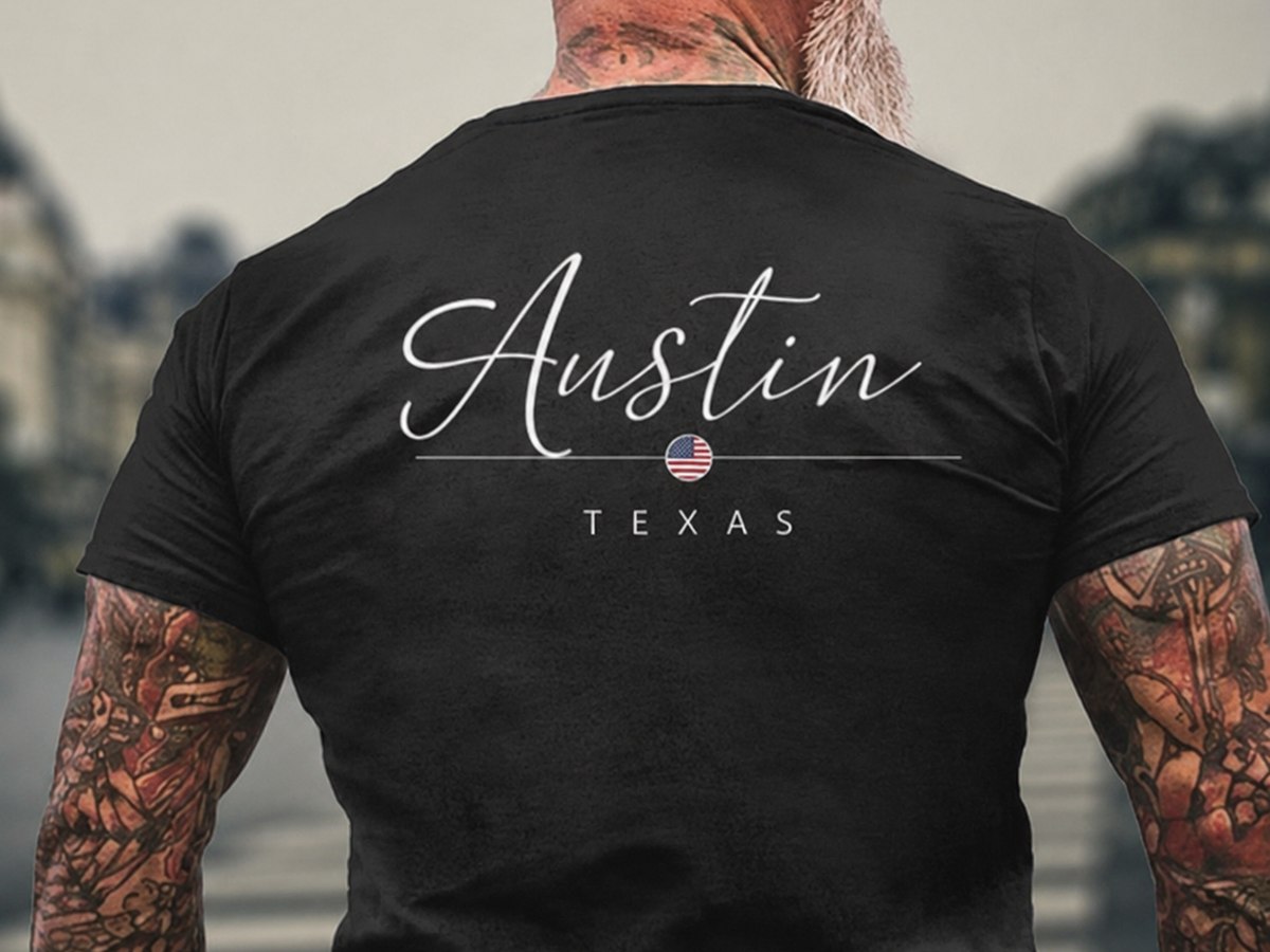 Austin Texas thin script across the back of a black tee