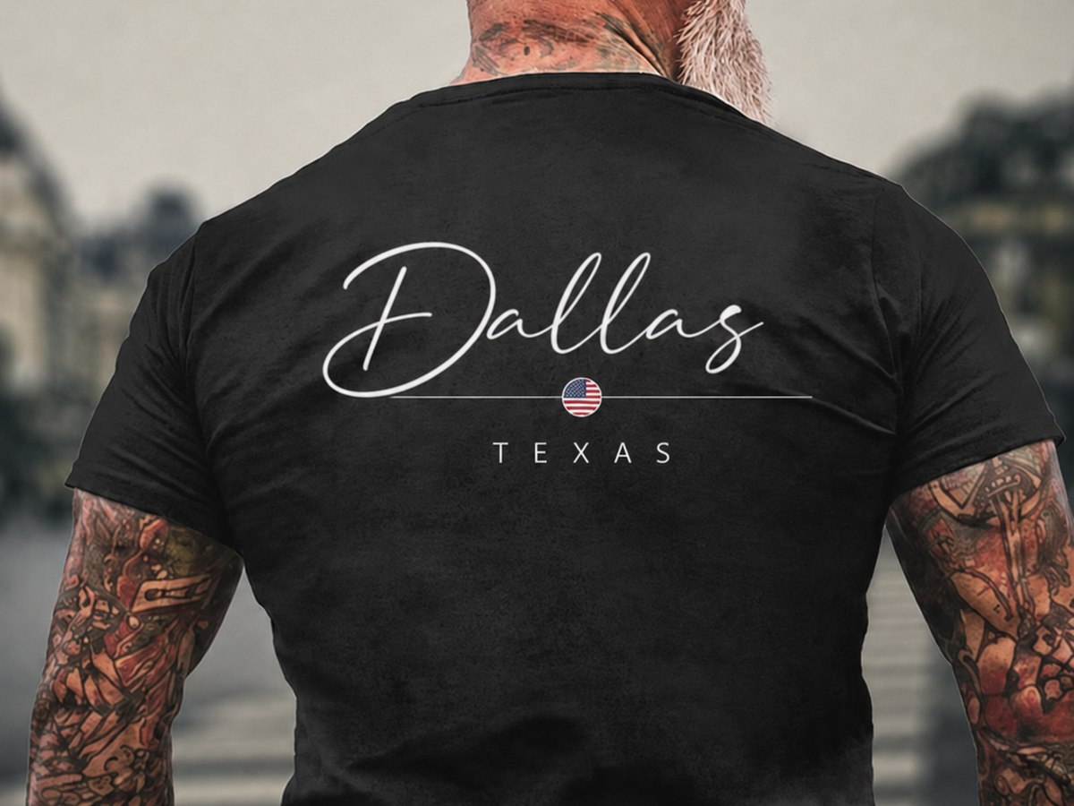 Dallas Texas script across the back of a black tee