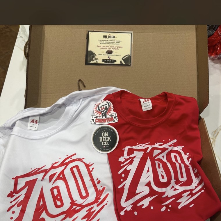 Custom ZOO team tees in red and white packed in an On Deck Co. box